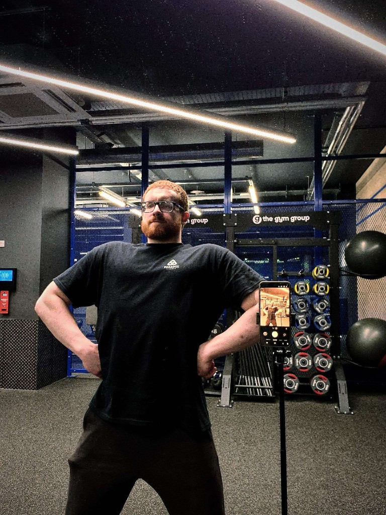 Davide, coach at Paradox Fitness, standing in The Gym Group White City.